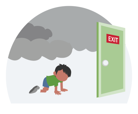 A child crawls on the ground toward an exit, to escape smoke during a fire